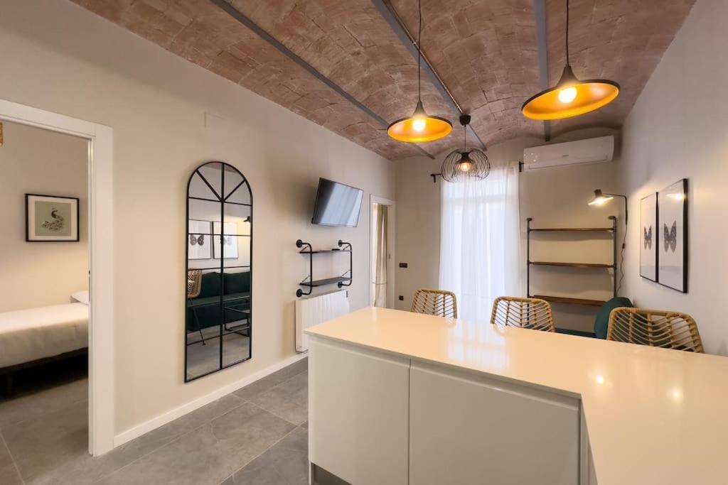 Televízia a/alebo spoločenská miestnosť v ubytovaní BeBarceloner Sants Apartments - 2 bedrooms