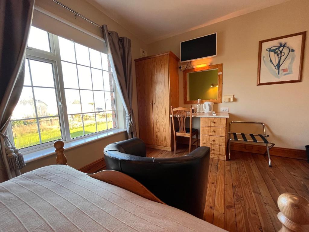 Postel nebo postele na pokoji v ubytování St Martin's, Rosslare Harbour Guest Accommodation