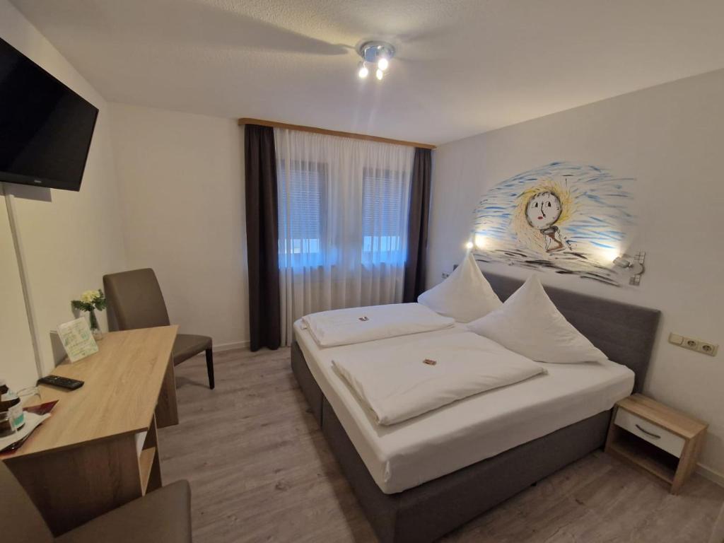 Postel nebo postele na pokoji v ubytování Das SP Hotel