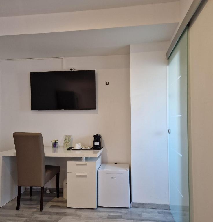 Kuchyň nebo kuchyňský kout v ubytování Das SP Hotel