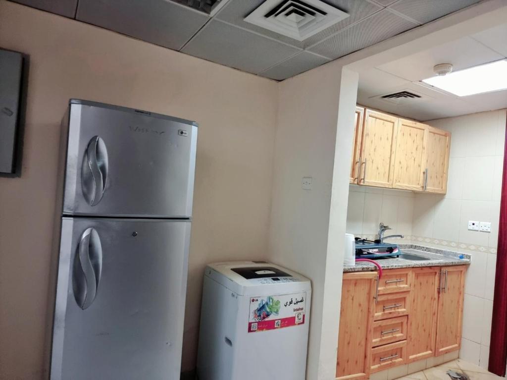 Kuchyň nebo kuchyňský kout v ubytování MBZ - Nice Bed Space "MEN"