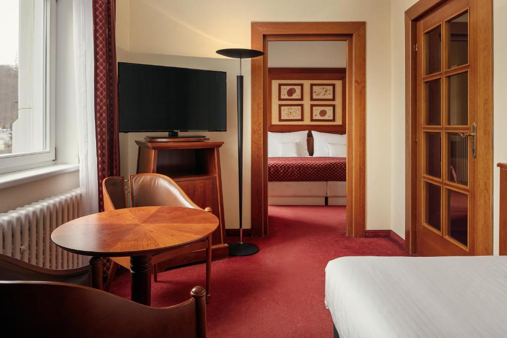 Postel nebo postele na pokoji v ubytování Spa Hotel Villa Smetana