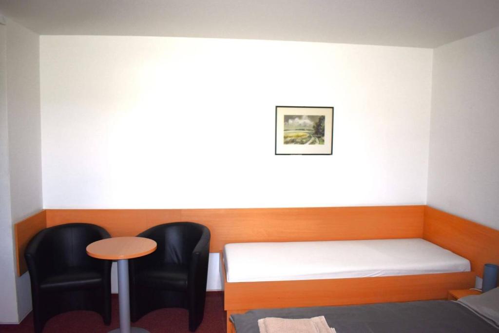Postel nebo postele na pokoji v ubytování Penzion Era