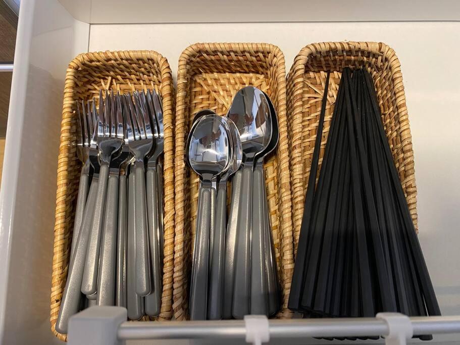 a group of forks and spoons in a drawer at FTH Moon Light 3min to Sta. in Shimo-yoshida