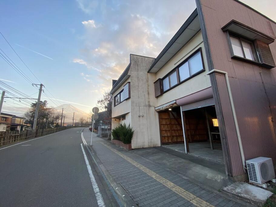 a building on the side of a street at FTH Moon Light 3min to Sta. in Shimo-yoshida