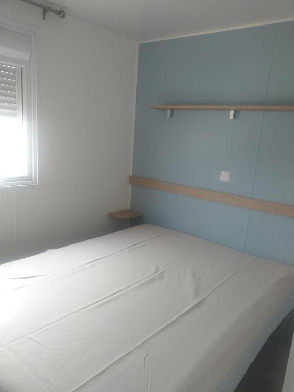 Postel nebo postele na pokoji v ubytování Camping La Maltournée