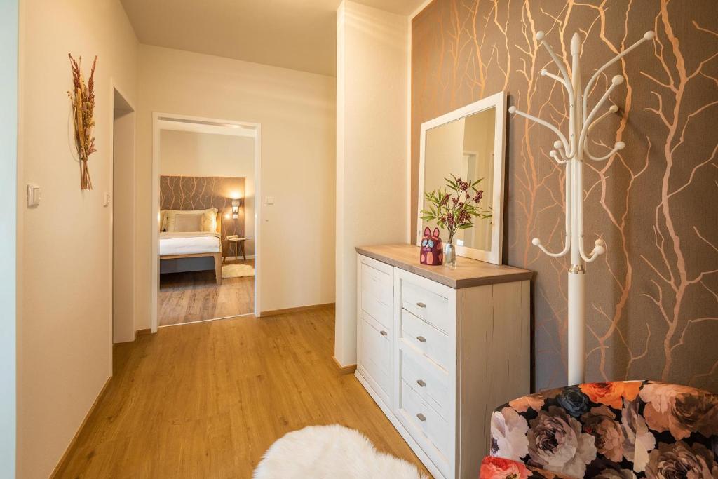 Postel nebo postele na pokoji v ubytování Appartements am Landschaweg