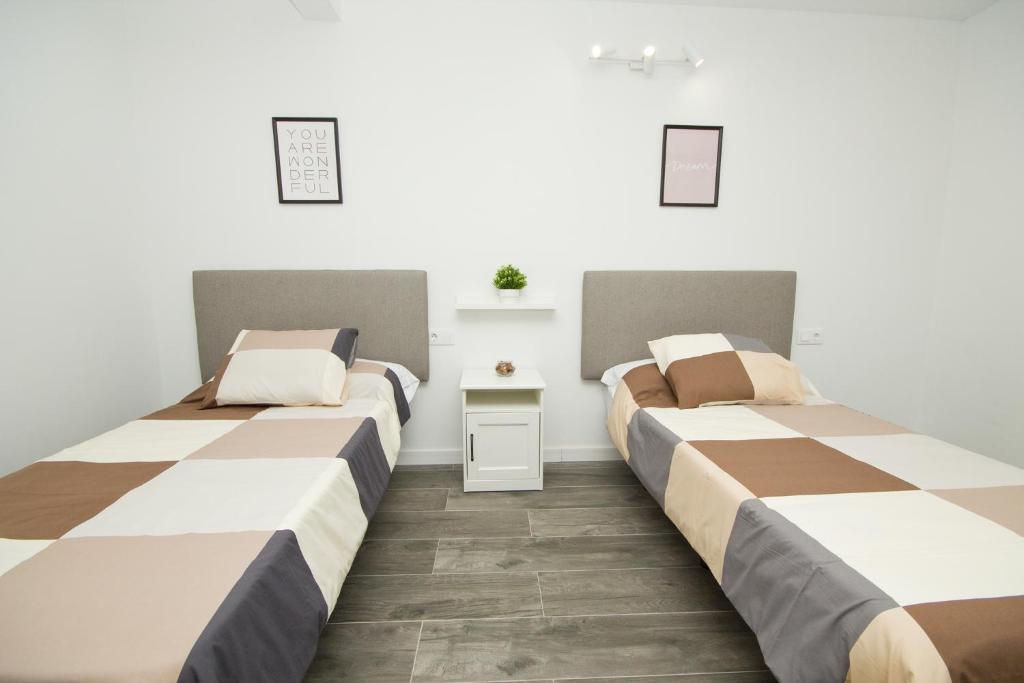 Postel nebo postele na pokoji v ubytování Los Alonsos - Open Mall - By AZ Rentals