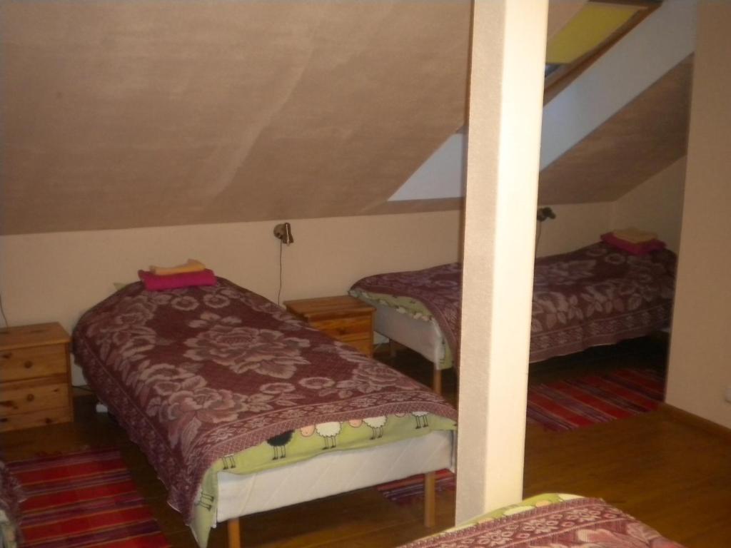 Postel nebo postele na pokoji v ubytování Madise Guesthouse