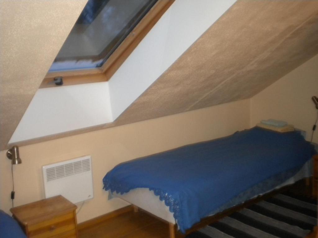Postel nebo postele na pokoji v ubytování Madise Guesthouse
