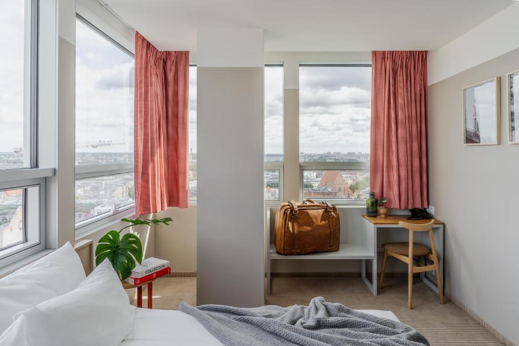 Postel nebo postele na pokoji v ubytování Hotel Altus Poznań Old Town - Destigo Hotels