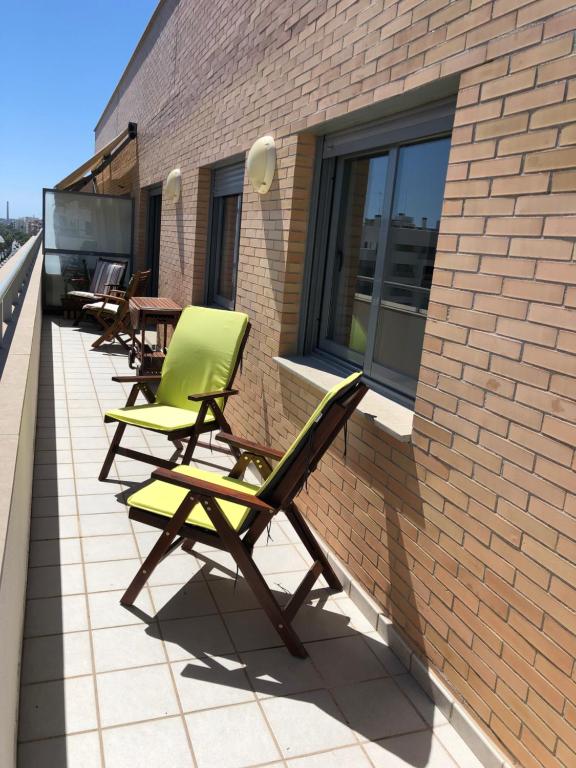 A balcony or terrace at Atico Pacifico Parking y Piscina gratis