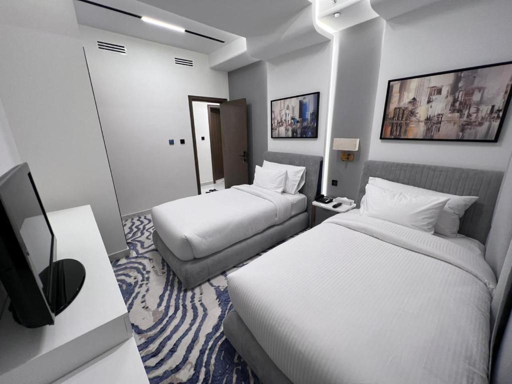 Postel nebo postele na pokoji v ubytování MD Hotel By Gewan