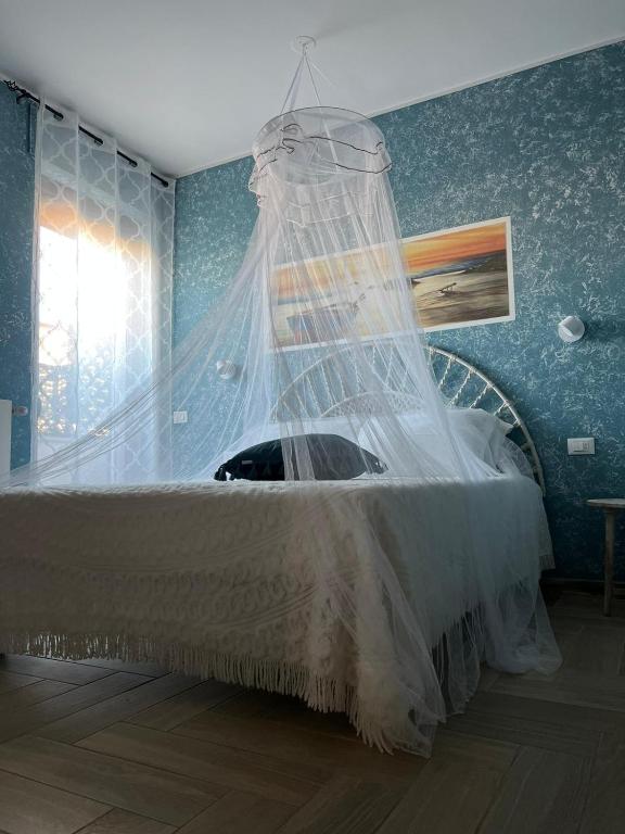 Postel nebo postele na pokoji v ubytování B&B Zio Cici
