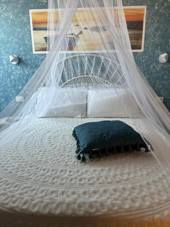 Postel nebo postele na pokoji v ubytování B&B Zio Cici