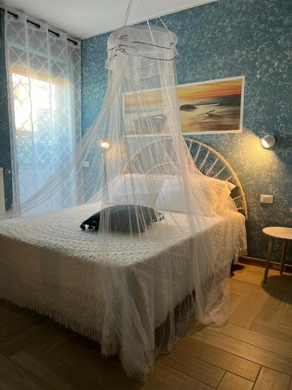 Postel nebo postele na pokoji v ubytování B&B Zio Cici