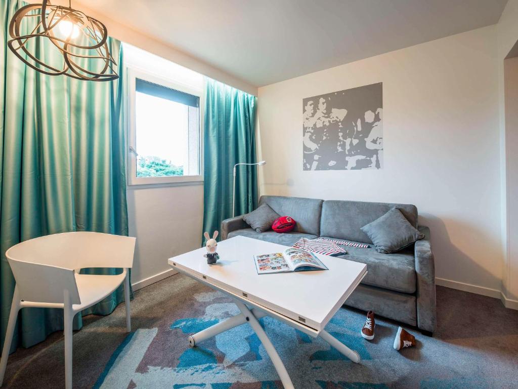 Posezení v ubytování ibis Styles Toulouse Nord Sesquieres