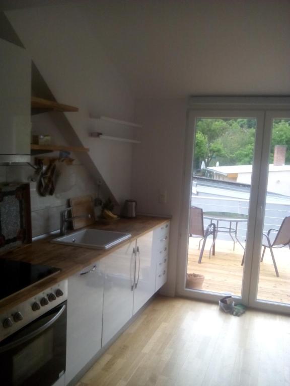 Kuchyň nebo kuchyňský kout v ubytování Ferienwohnung am Teupitzsee