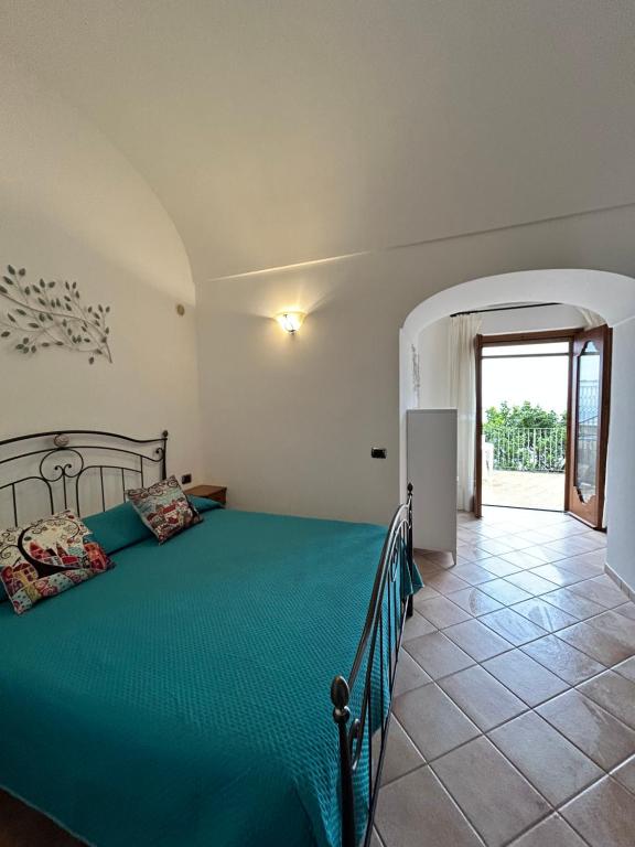 Ένα ή περισσότερα κρεβάτια σε δωμάτιο στο Casa Barone