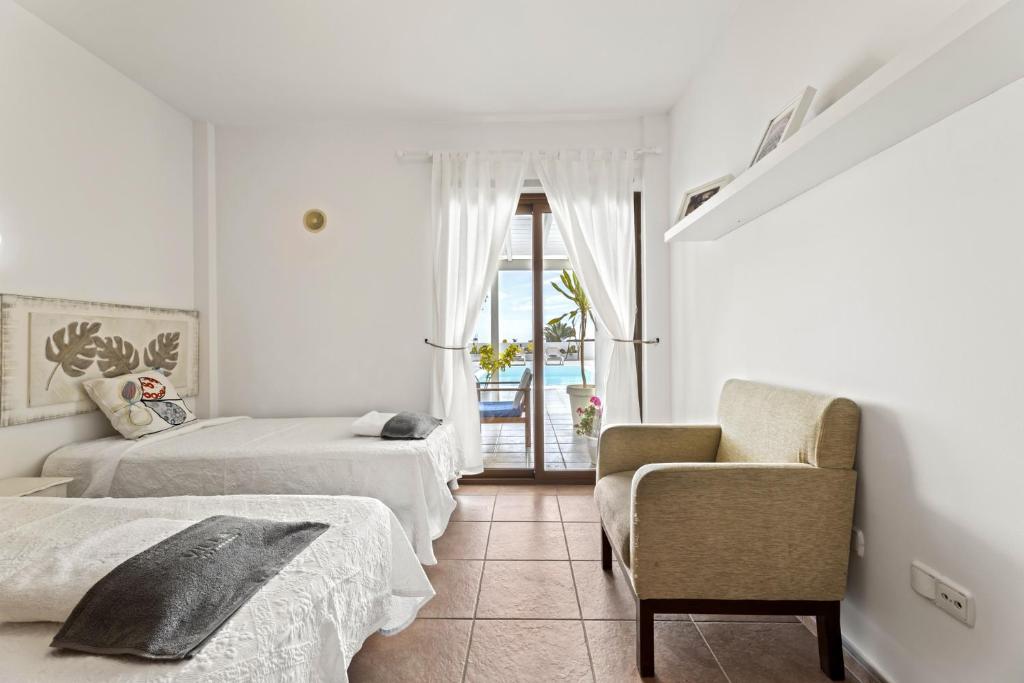 Postel nebo postele na pokoji v ubytování Villa Flora - VipVipVillas