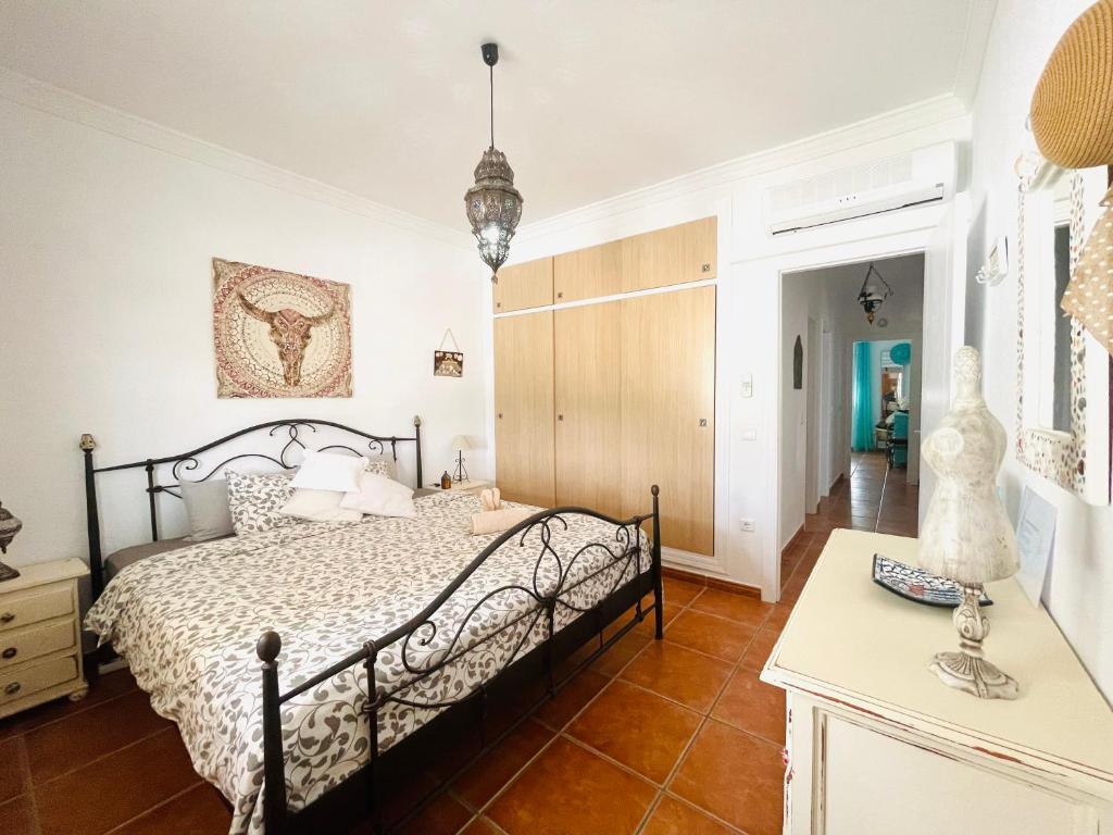 Postel nebo postele na pokoji v ubytování Casira, casitas en kamers, Viñuela, Andalucía