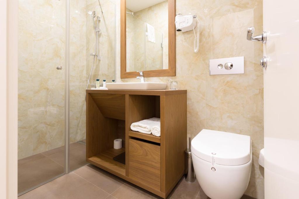 Koupelna v ubytování Hotel City Savoy