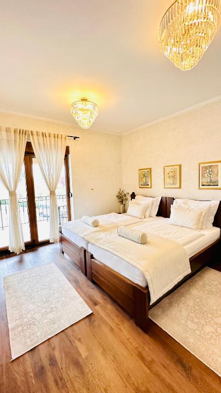 Voodi või voodid majutusasutuse Zrinka House toas