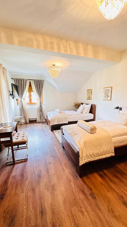 Voodi või voodid majutusasutuse Zrinka House toas