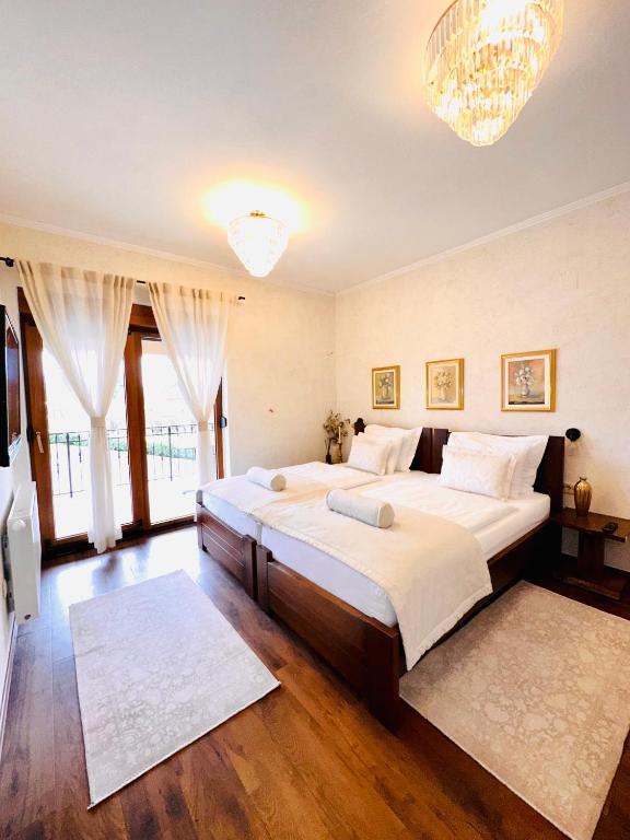 Voodi või voodid majutusasutuse Zrinka House toas
