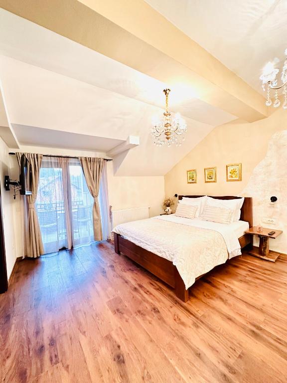 Voodi või voodid majutusasutuse Zrinka House toas