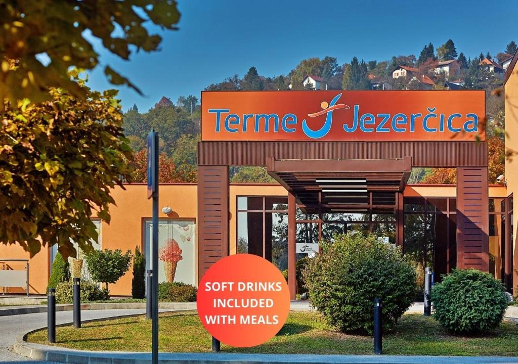 a sign in front of a temne jerezi restaurant at Hotel Terme Jezercica in Donja Stubica