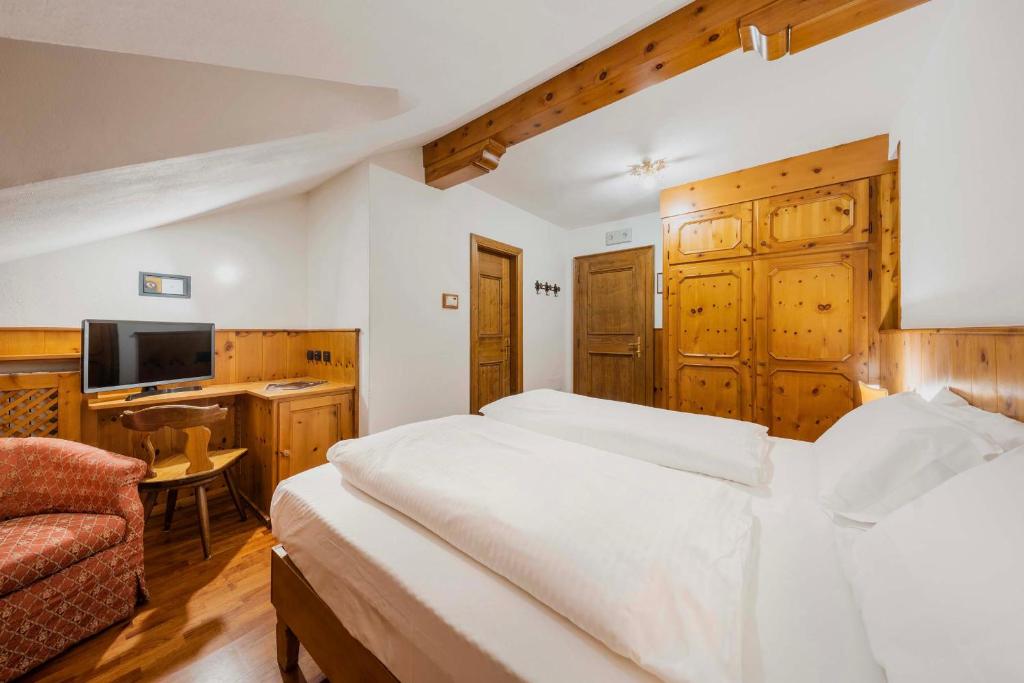 Postel nebo postele na pokoji v ubytování Franceschi Park Hotel