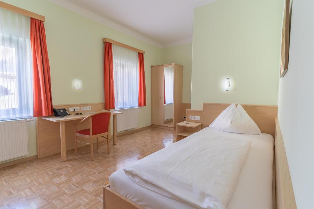 Postel nebo postele na pokoji v ubytování Hotel Kindler 2,0 Self-Check-In