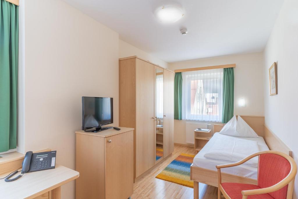 TV a/nebo společenská místnost v ubytování Hotel Kindler 2,0 Self-Check-In