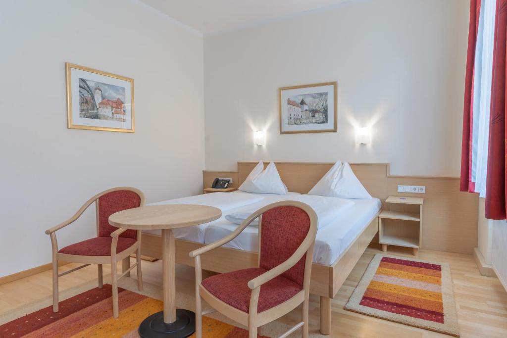 Postel nebo postele na pokoji v ubytování Hotel Kindler 2,0 Self-Check-In