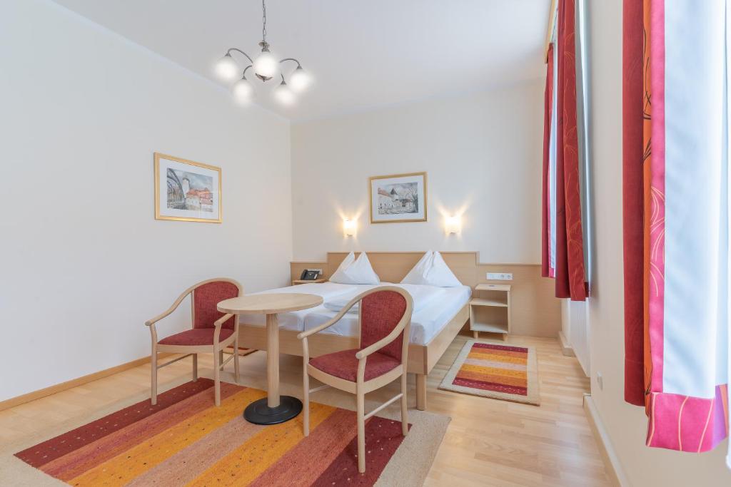 Postel nebo postele na pokoji v ubytování Hotel Kindler 2,0 Self-Check-In