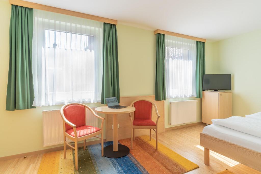TV a/nebo společenská místnost v ubytování Hotel Kindler 2,0 Self-Check-In