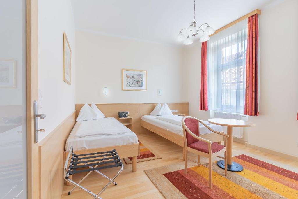 Postel nebo postele na pokoji v ubytování Hotel Kindler 2,0 Self-Check-In