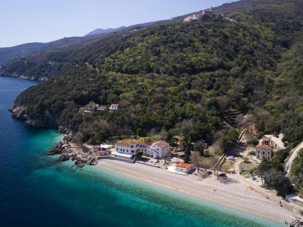 an aerial view of a beach with houses and the water at Apartments Hera in Mošćenička Draga
