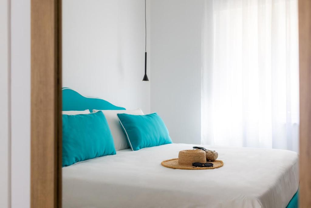 Postel nebo postele na pokoji v ubytování Vittoria Rooms Sorrento