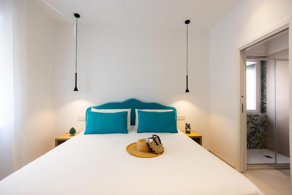 Postel nebo postele na pokoji v ubytování Vittoria Rooms Sorrento