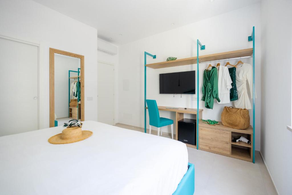 Postel nebo postele na pokoji v ubytování Vittoria Rooms Sorrento