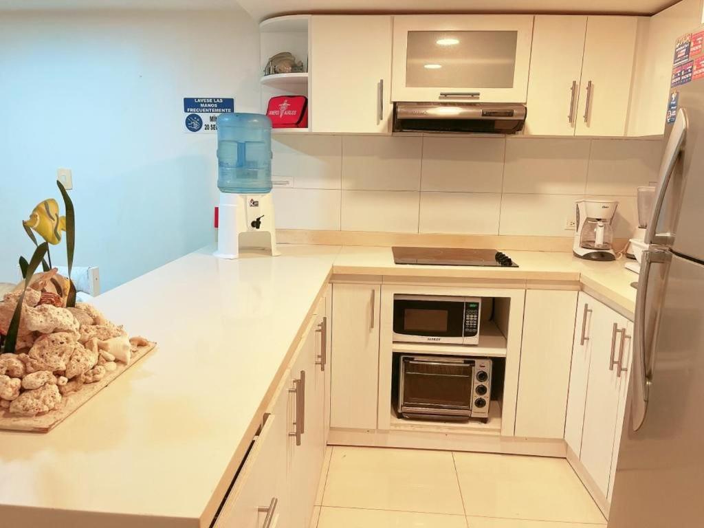 Kuchyň nebo kuchyňský kout v ubytování Espectaculares Aptos Hansa Coral San Andres Islas