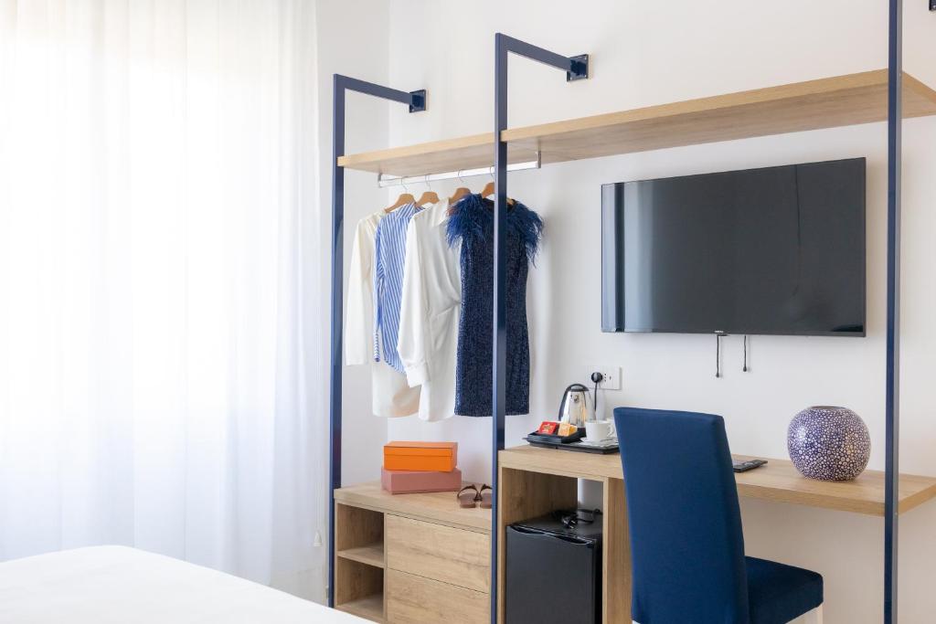 Postel nebo postele na pokoji v ubytování Vittoria Rooms Sorrento
