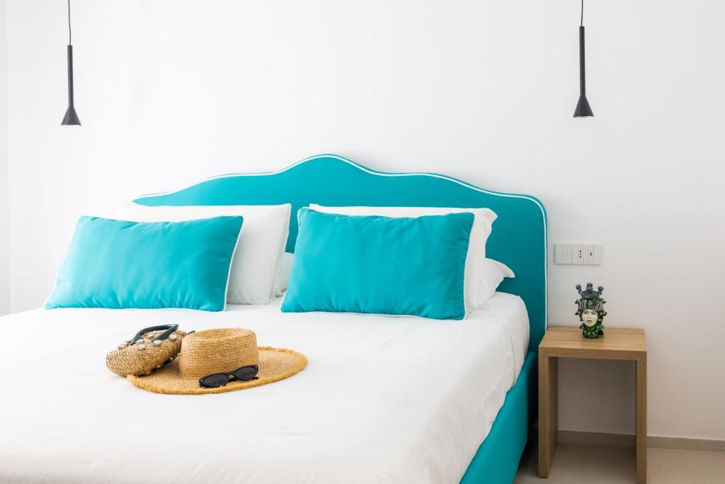 Postel nebo postele na pokoji v ubytování Vittoria Rooms Sorrento