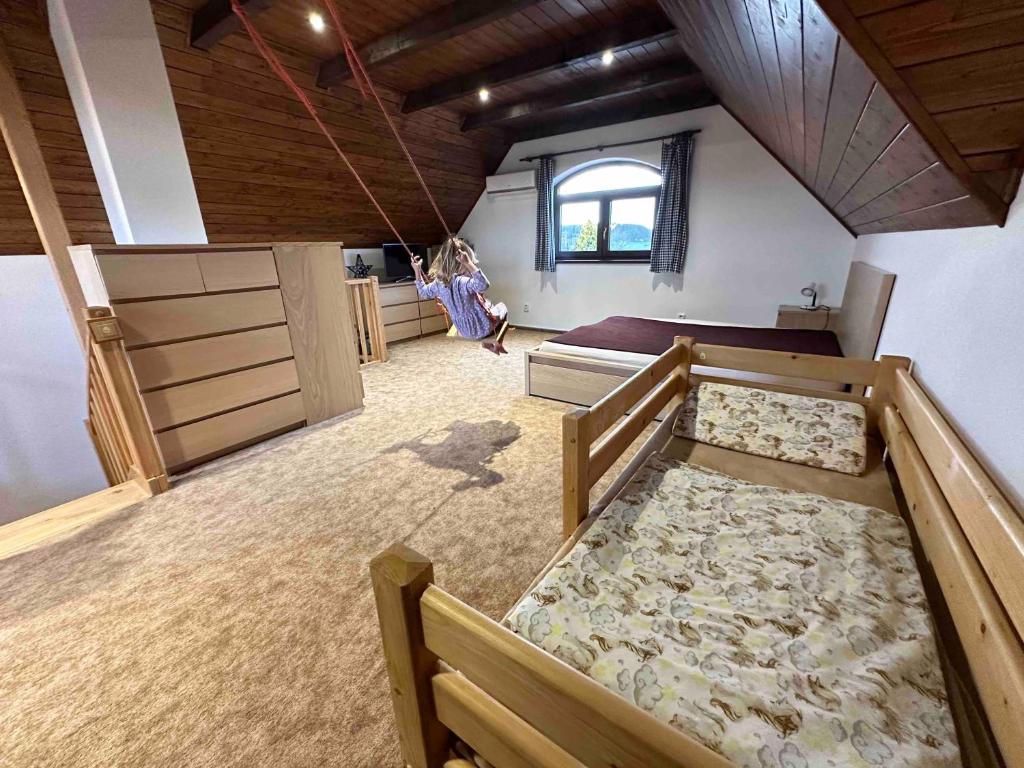 Postel nebo postele na pokoji v ubytování Penzion - Apartman Přestavlky
