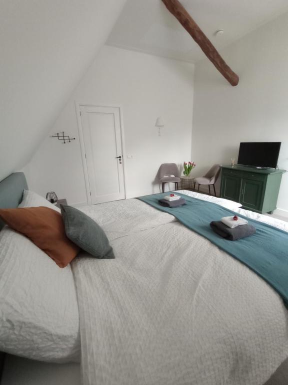 Postel nebo postele na pokoji v ubytování B&B Suyder Cogge