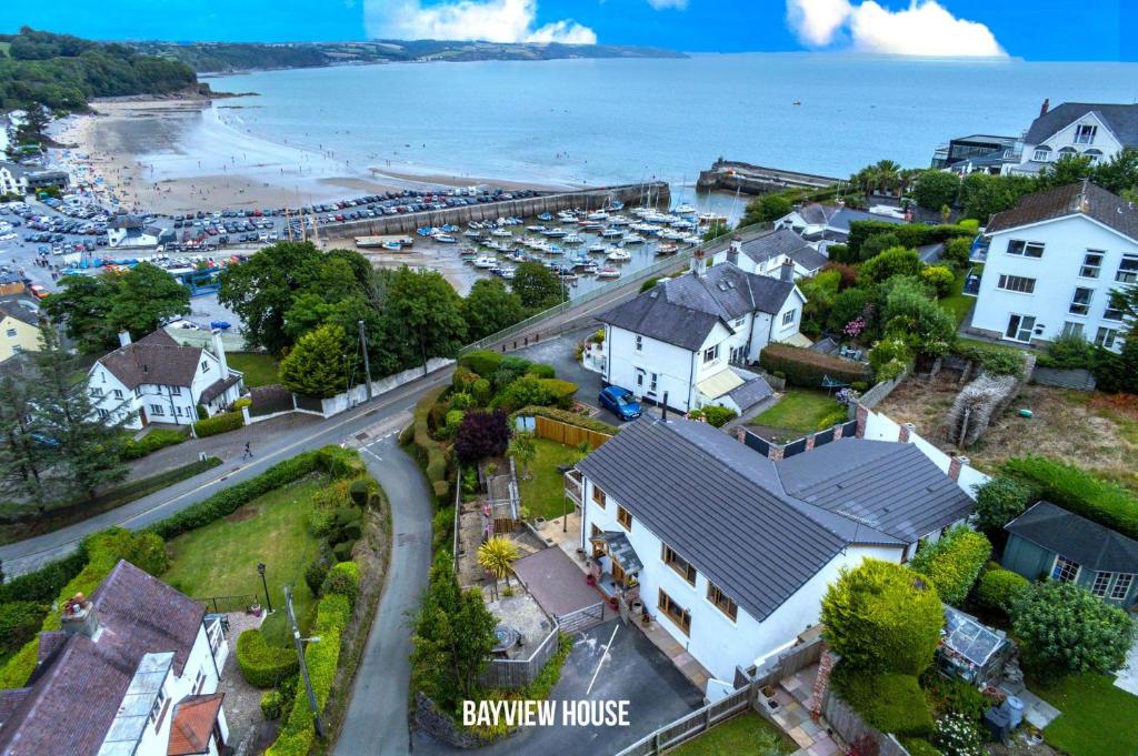 an aerial view of a town with a marina at Bayview House - 4 Bedroom Luxurious Holiday Home - Saundersfoot in Saundersfoot