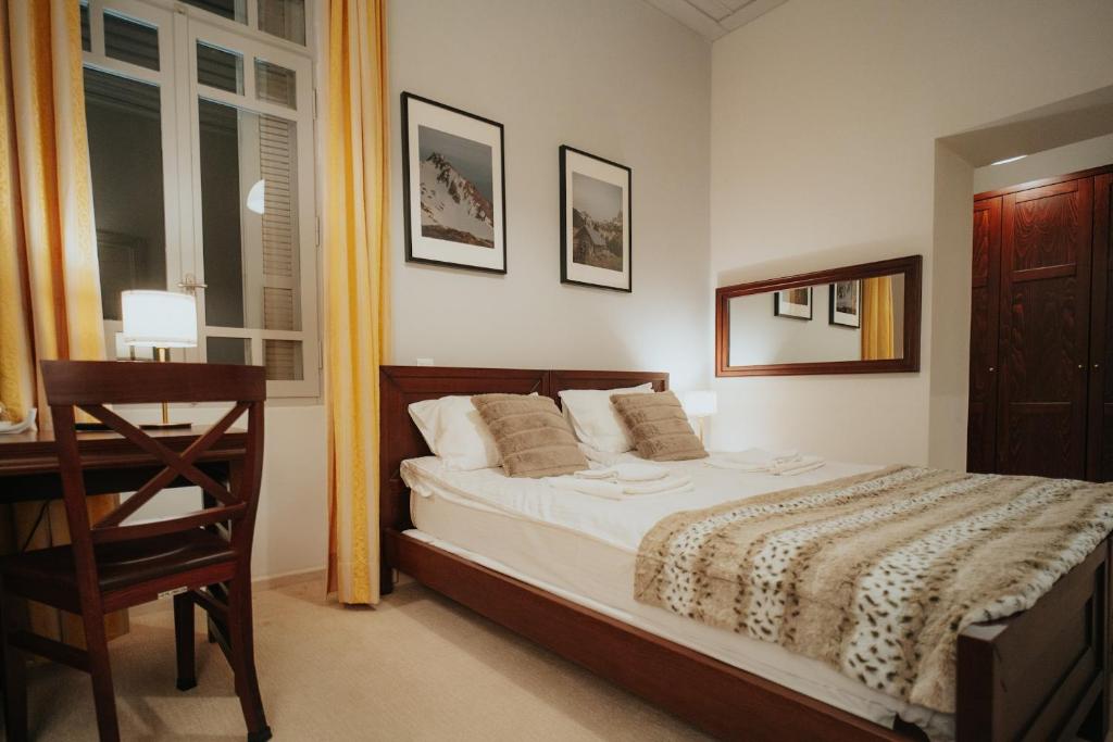 Postel nebo postele na pokoji v ubytování 1909 Guesthouse