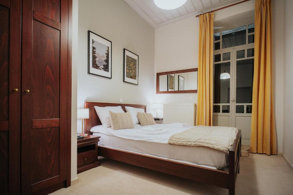Postel nebo postele na pokoji v ubytování 1909 Guesthouse